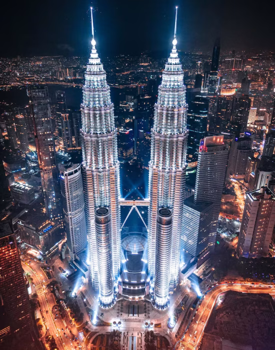 high-angle-view-illuminated-buildings-city-night_1048944-27939256