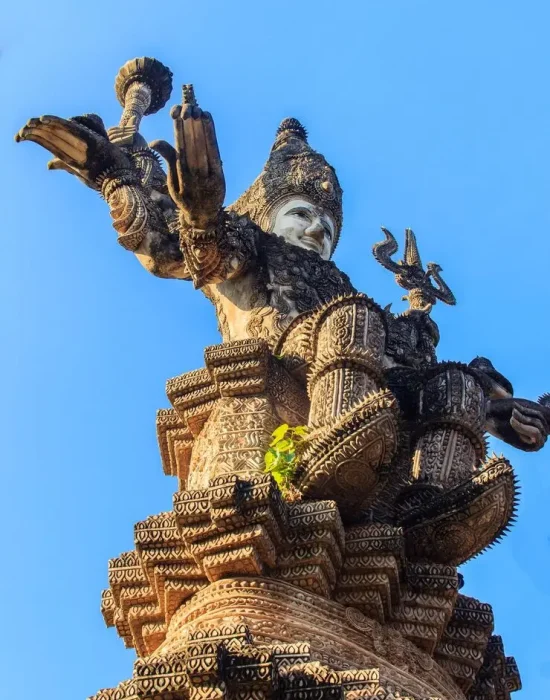 low-angle-view-statue-against-blue-sky_1048944-26189761